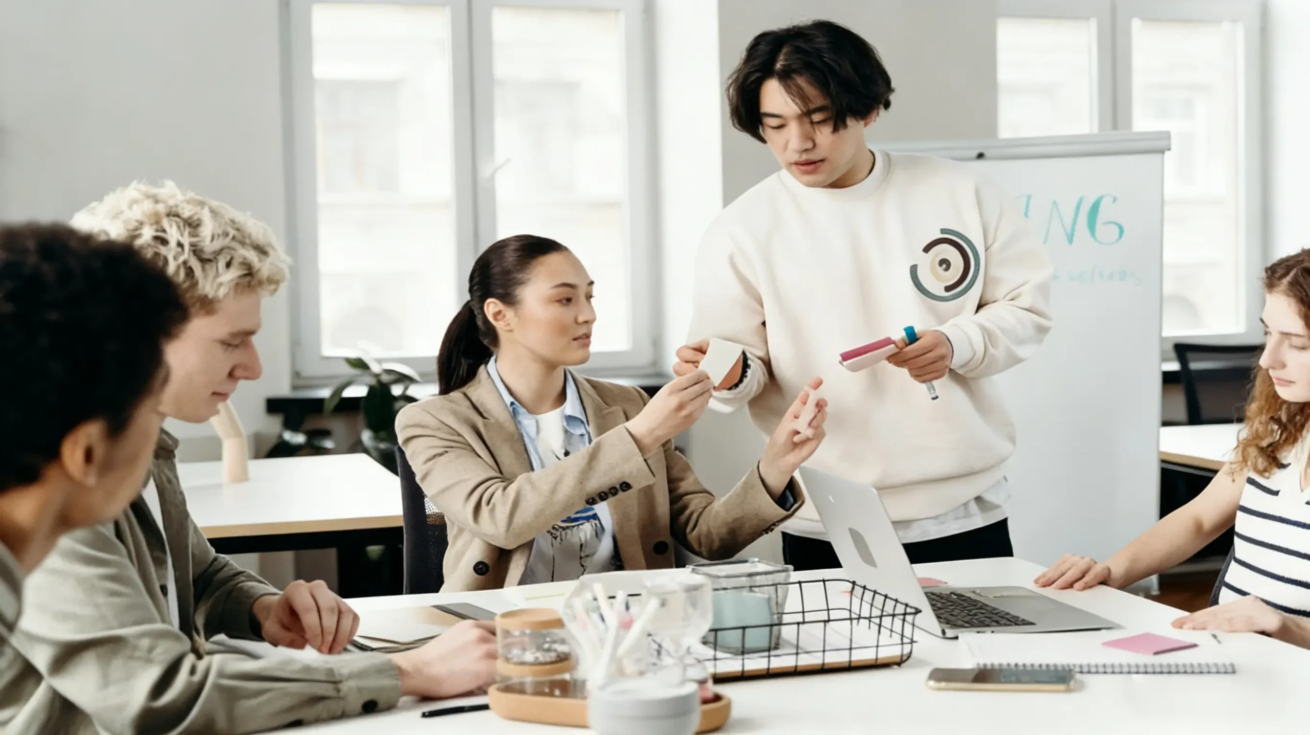 startup founder discussing toy manufacturing project with factory partner