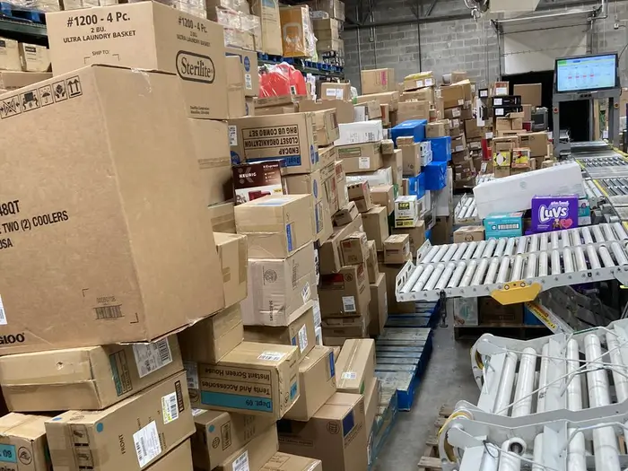 unsold toy inventory stacked in warehouse storage shelves
